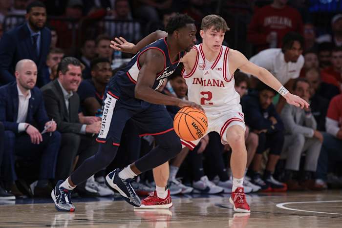 Connecticut Huskies guard Hassan Diarra (10) dribbles against Indiana Hoosiers guard Gabe Cupps (2) during the second half at Madison Square Garden.